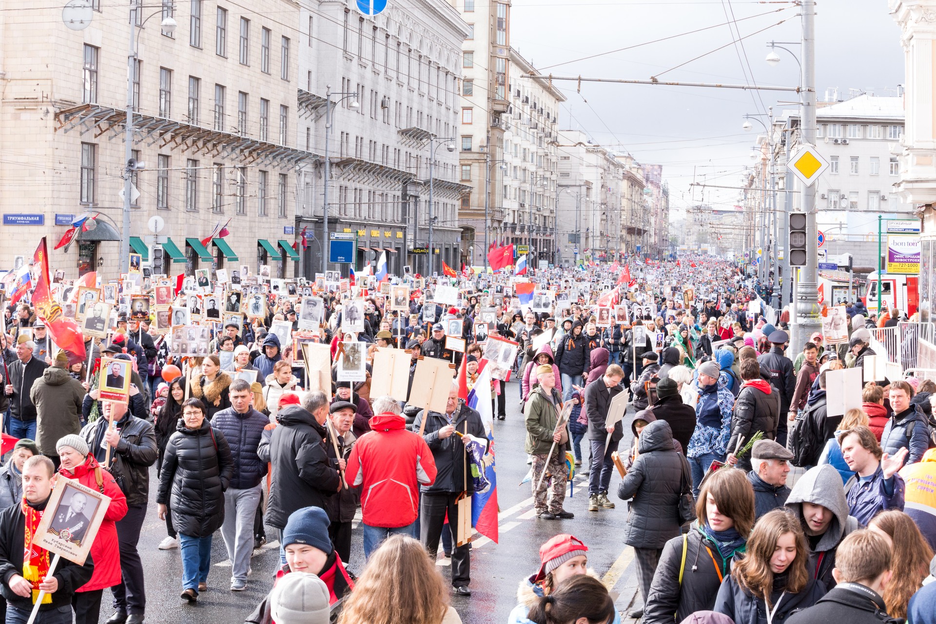 Immortal Regiment procession in Victory Day - thousands of people marching along Tverskaya Street toward the Red Square and Kremlin in memory of the participants of the World War Two in Moscow, Russia